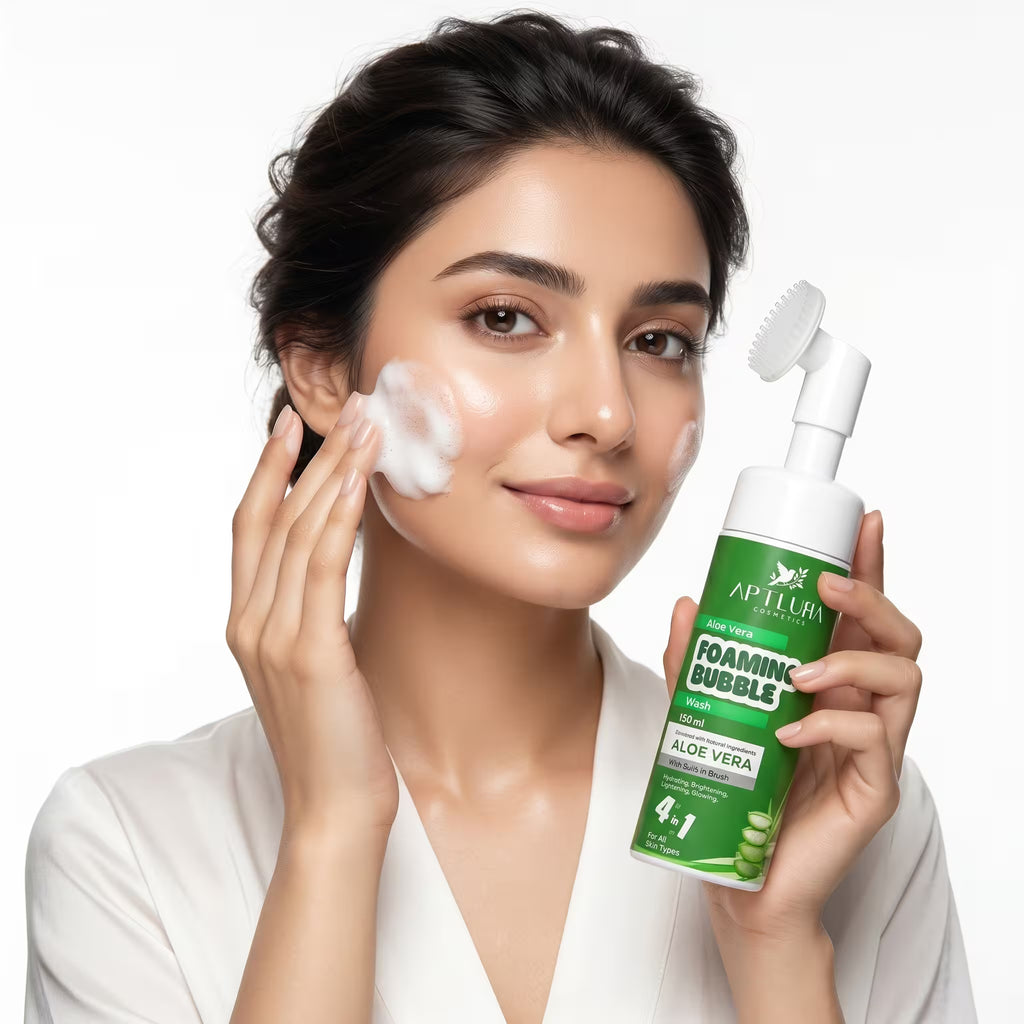 Woman applying foaming bubble cleanser to her face with a product in hand on a white background