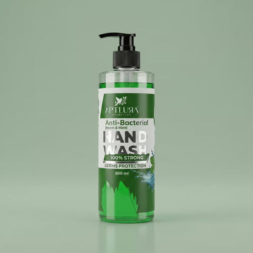 Bottle of Aptlura Naturals green and mint hand wash on a green background