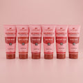 Row of Aptlura skincare products on a pink background