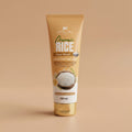 Tube of Appella Organic Rice Face Wash on a beige background