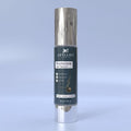Rootscare hair serum bottle with silver cap on a light blue background