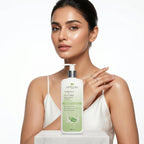 Woman holding a bottle of Aptlura Aloe Vera Goat Milk Moisturizing Lotion on a white background