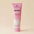 Pink tube of Aptlura Goat Milk Face Wash on a beige background