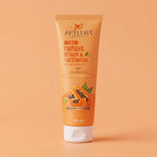 Tube of Aptlura Papaya Scrub & Facewash on an orange background