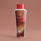Aptlura Red Onion Shampoo bottle on a brown background