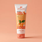 Tube of Aptlura Vitamin C Face Wash on a peach background