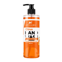 Orange hand wash bottle with pump on a white background