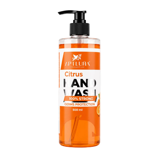 Orange hand wash bottle with pump on a white background