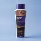 Aptlura Cosmetics Damage Repair Shampoo bottle on a light blue background
