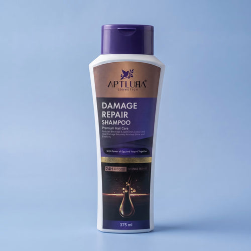 Aptlura Cosmetics Damage Repair Shampoo bottle on a light blue background