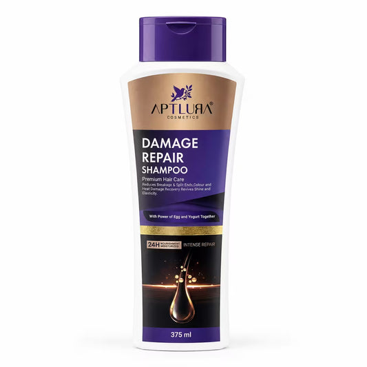A 375 ml bottle of Aptlura Cosmetics Damage Repair Shampoo on a plain white background. The bottle is white with a purple cap and a label featuring purple, gold, and black sections with product text.
