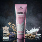 Pink tube of Aptlura Goat Milk Face Wash with goat milk splashes and ingredients on a dark background