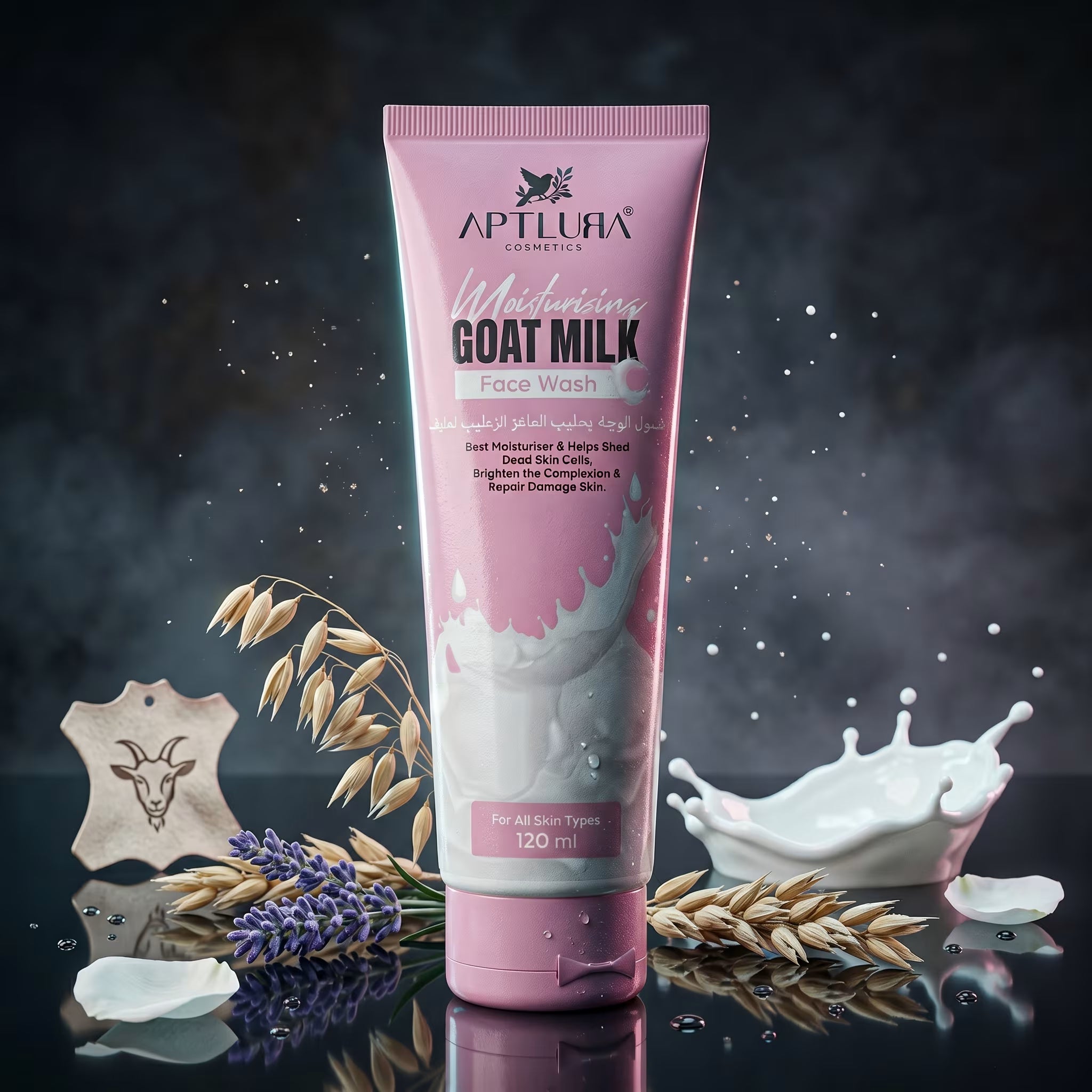 Pink tube of Aptlura Goat Milk Face Wash with goat milk splashes and ingredients on a dark background