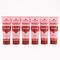 Set of Aptlura skincare products with pink and red packaging on a white background