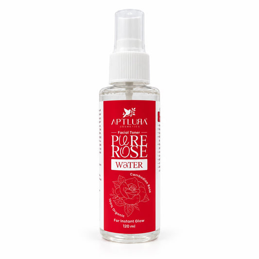 A 120 ml clear plastic spray bottle of Aptlura Pure Rose Water facial toner with a white spray cap and a red label featuring a rose graphic.