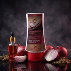 Aptlura Red Onion Conditioner bottle with red onions and a dropper bottle on a dark background