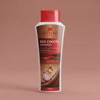 Aptlura Red Onion Shampoo bottle on a brown background