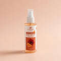 Bottle of Aptlura Vitamin C Rose Water Facial Toner on a beige background