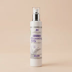 Cleansing milk bottle with a beige background