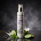 Bottle of Aptlura Brightening Cleansing Milk with cucumbers and mint leaves on a dark background