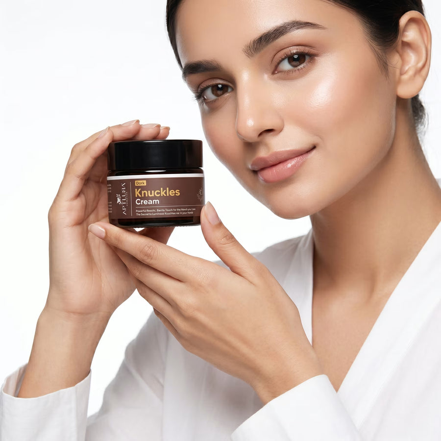 Woman holding a jar of 'Knuckles Cream' with a white background
