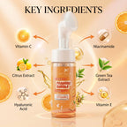 Foaming bubble wash bottle with key ingredients labeled on a beige background