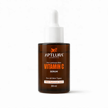 A 30 ml bottle of Aptlura Cosmetics Vitamin C Serum, featuring an amber brown glass bottle and a white dropper cap, set against a plain white background.