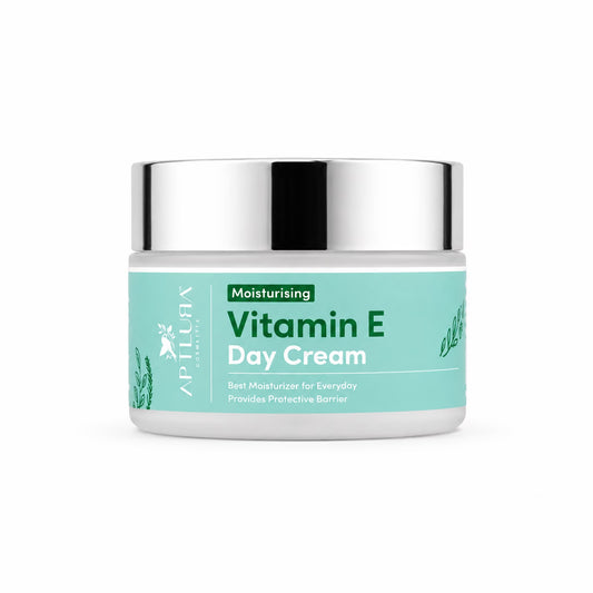 Vitamin E day cream jar with a silver lid on a white background